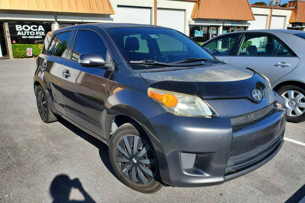 Scion Auto Repair in Boca Raton, FL - Boca Auto Fix Scion auto repair in Boca Raton, FL by Boca Auto Fix. An image of a black Scion car parked outside.