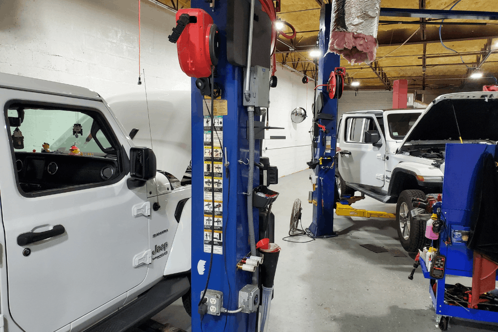 Jeep repair in Boca Raton, FL, at Boca Auto Fix. Image of Jeep Wrangler vehicles receiving professional diagnostics, maintenance, and repair services in a fully equipped auto repair facility, helping drivers maintain reliable performance on and off the road.